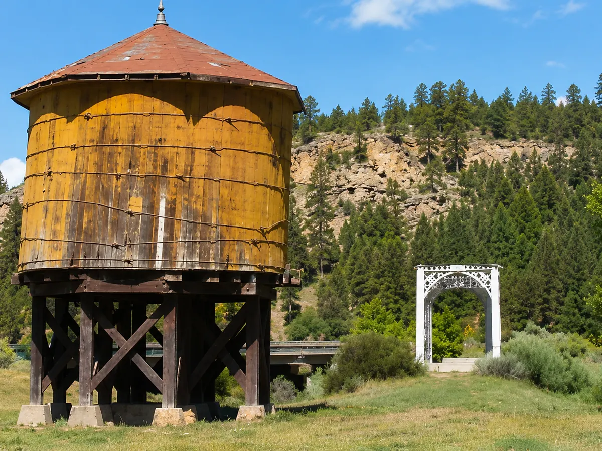 AI-generated illustration of a historic South Fork-area water tower and decorative arch